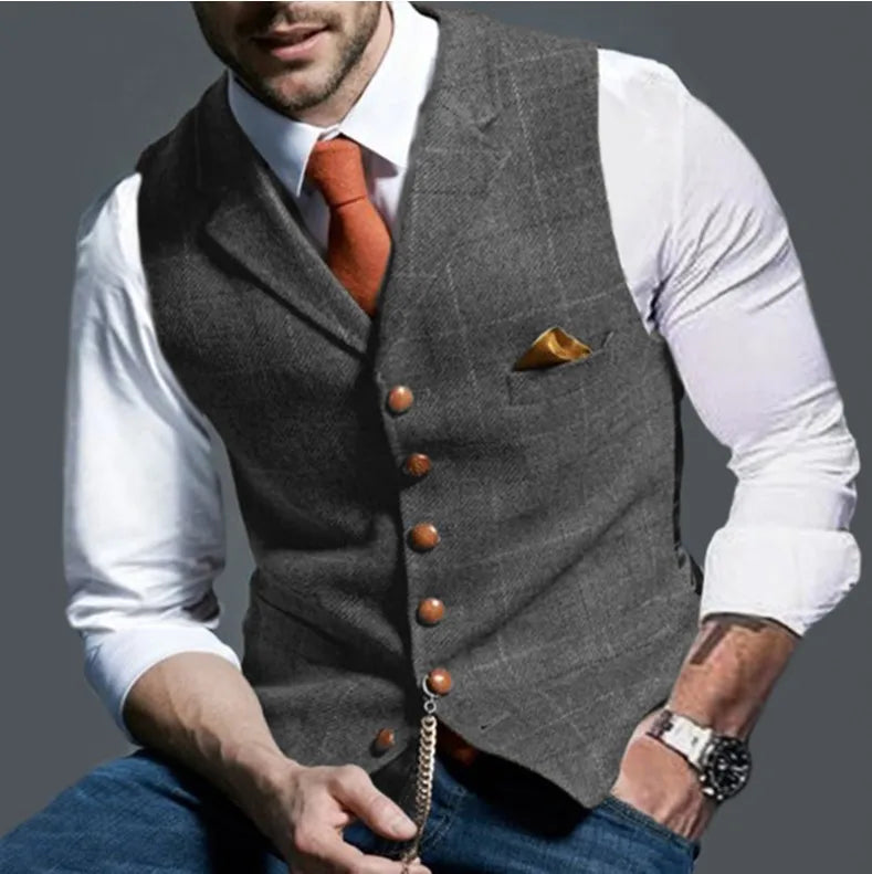 Tweed vest paired with a blazer, ideal for a stylish business outfit.