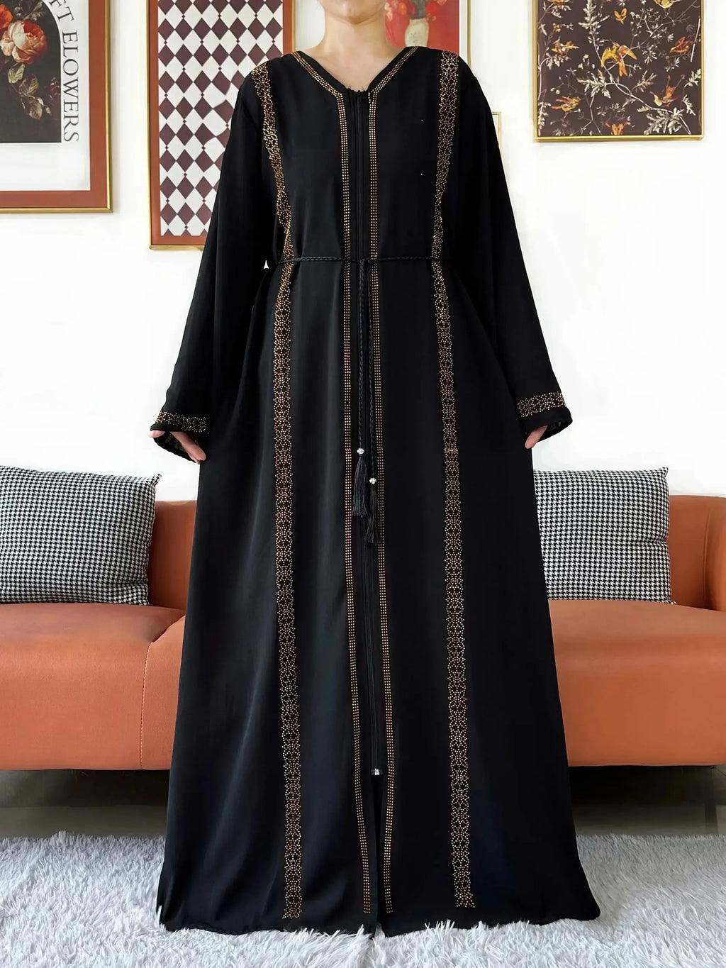 Flowing Whisper of Elegance abaya showcasing lightweight fabric and full-length zipper.