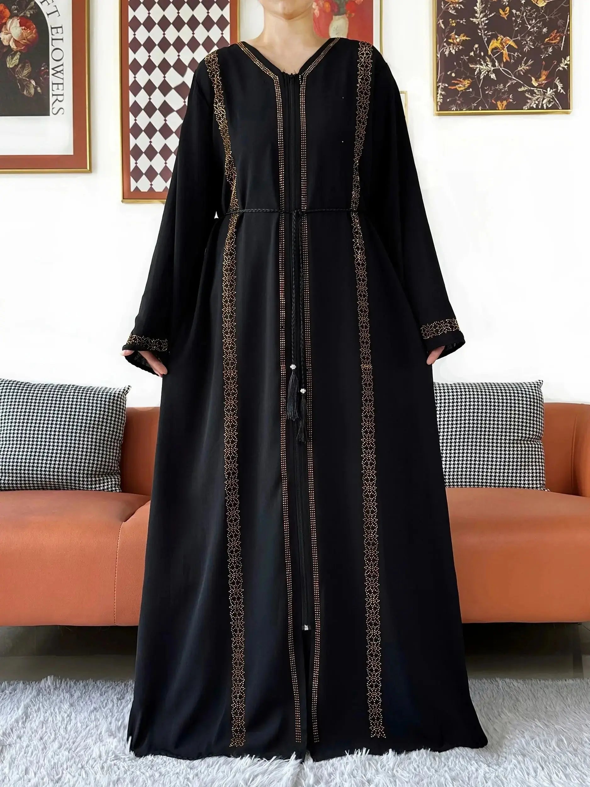 Flowing Whisper of Elegance abaya showcasing lightweight fabric and full-length zipper.