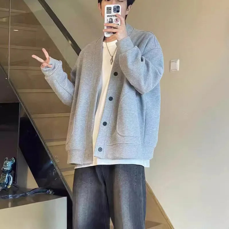 Single-breasted design of the Autumn Whisper cardigan showcasing elegant O-neck finish.