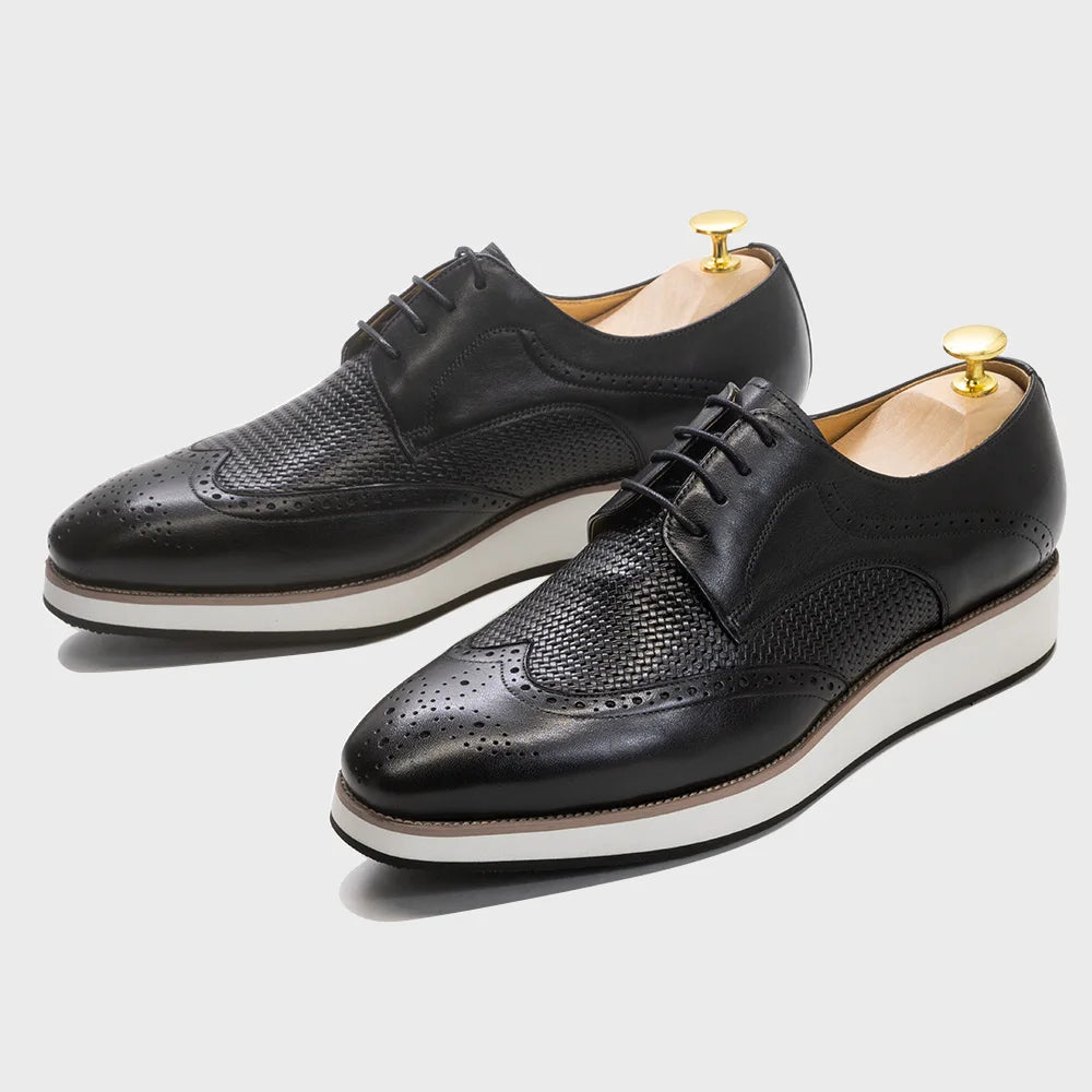Dark brown wingtip derby shoes in supple genuine leather that develops distinguished patina over time