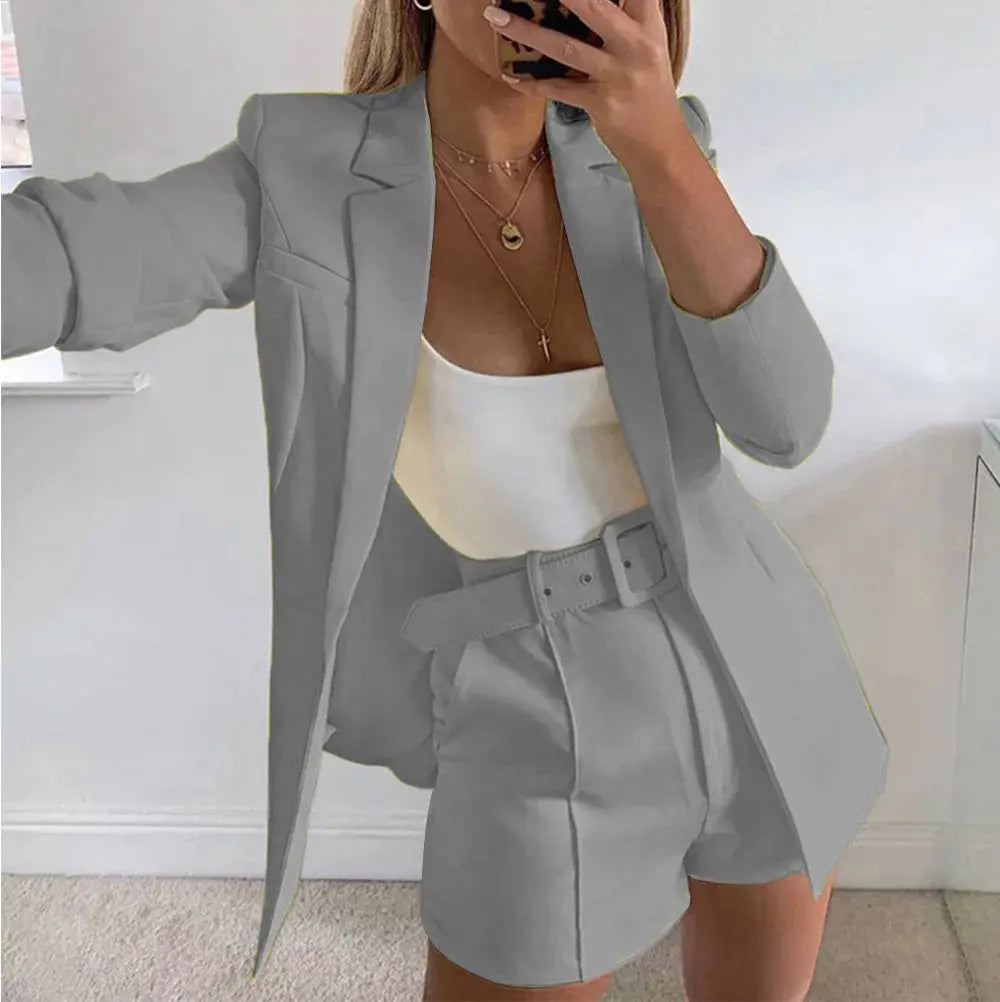 Close-up of blazer's tailored fit, emphasizing authority and sophistication.