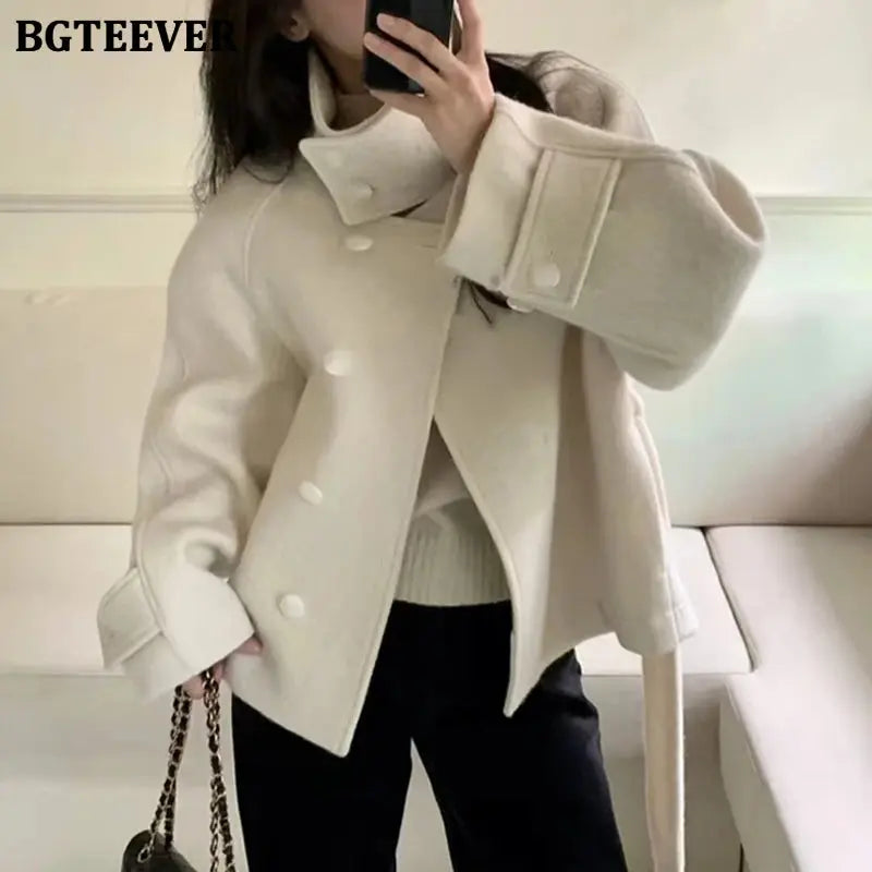 Model wearing the Winter Whisperer Wool Coat, perfect for day to night versatility.