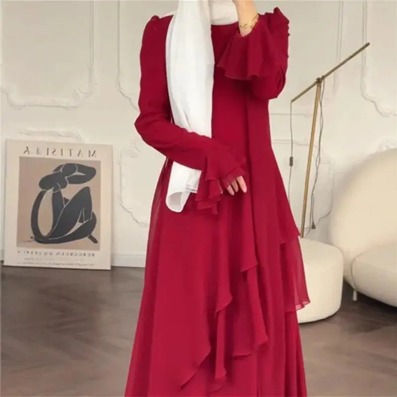 Model wearing a sophisticated black Abaya, highlighting its timeless appeal and comfort.