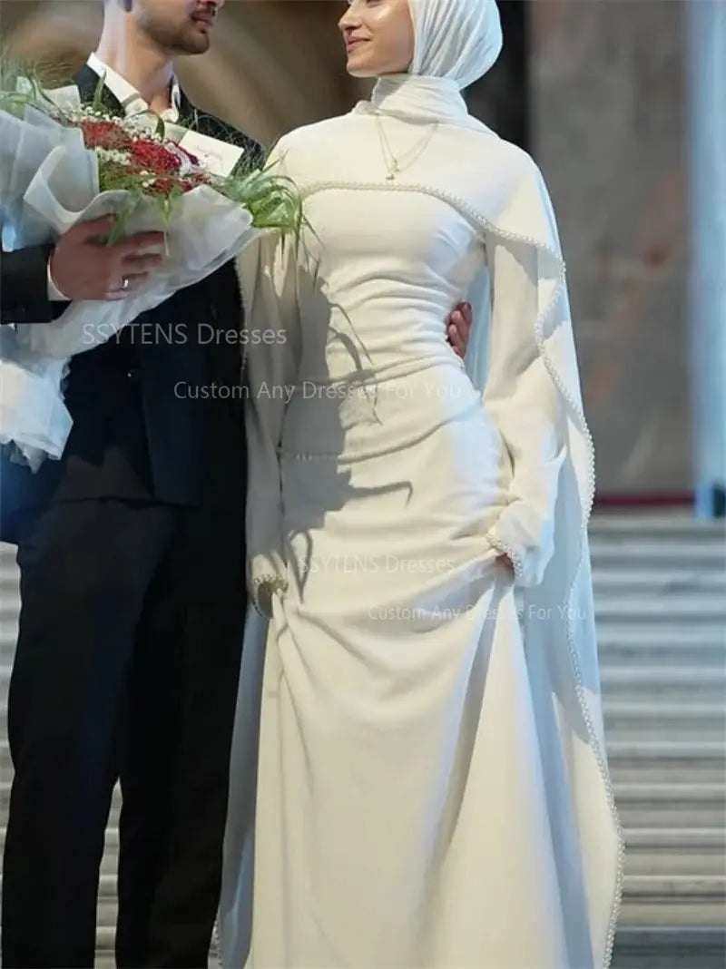Photogenic satin bridal gown radiating in light, designed for unforgettable wedding memories.