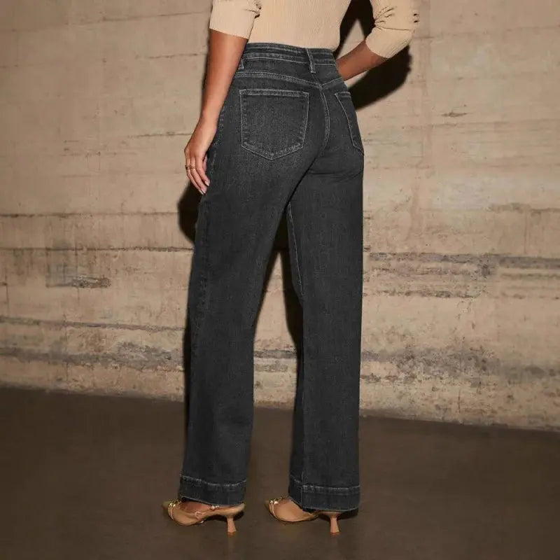 Model wearing Retro Chic Jeans, highlighting the flattering fit and elongating silhouette for modern retro fashion.