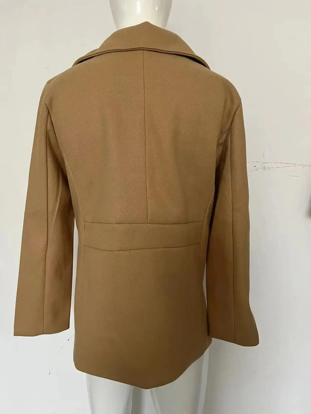 Back view of the Winter Whisperer Tweed Peacoat highlighting its sleek design and durable construction.