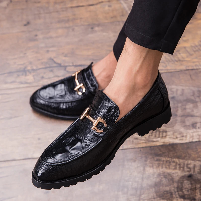 Croc-embossed leather loafers with metallic sheen for a stylish look.