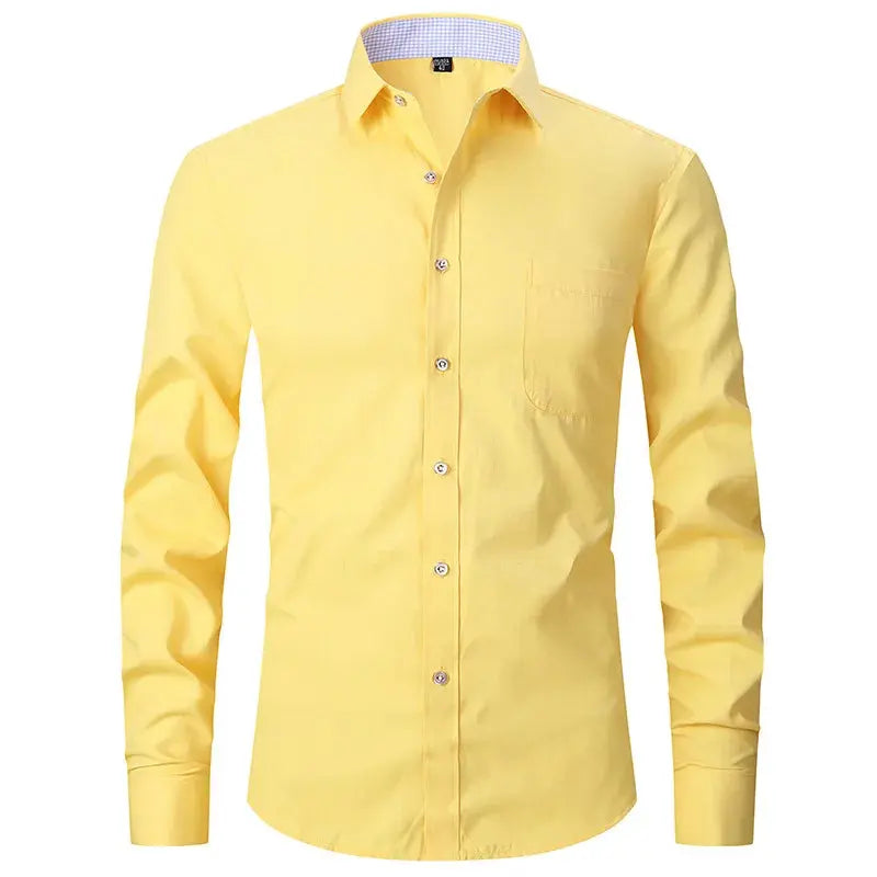 Model confidently wearing the white shirt at a business meeting.