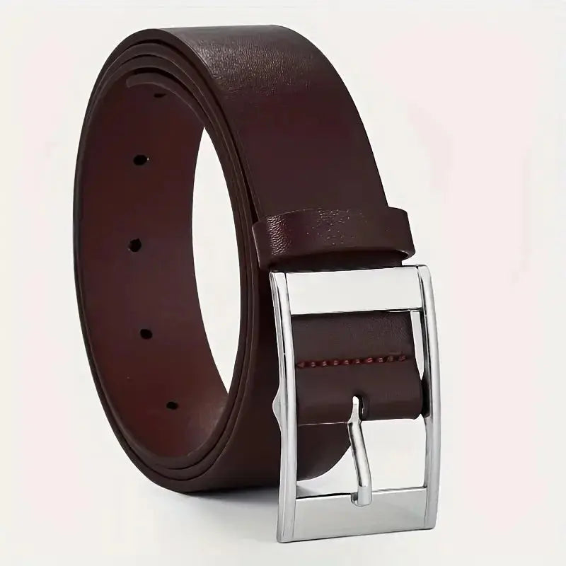 Close-up of the sleek design of the unisex leather belt with metal buckle.