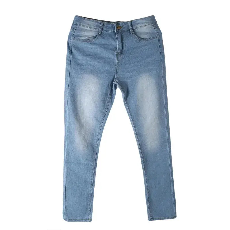 Model wearing Contour High-Waist Jeans styled with a casual tee for a chic day look.