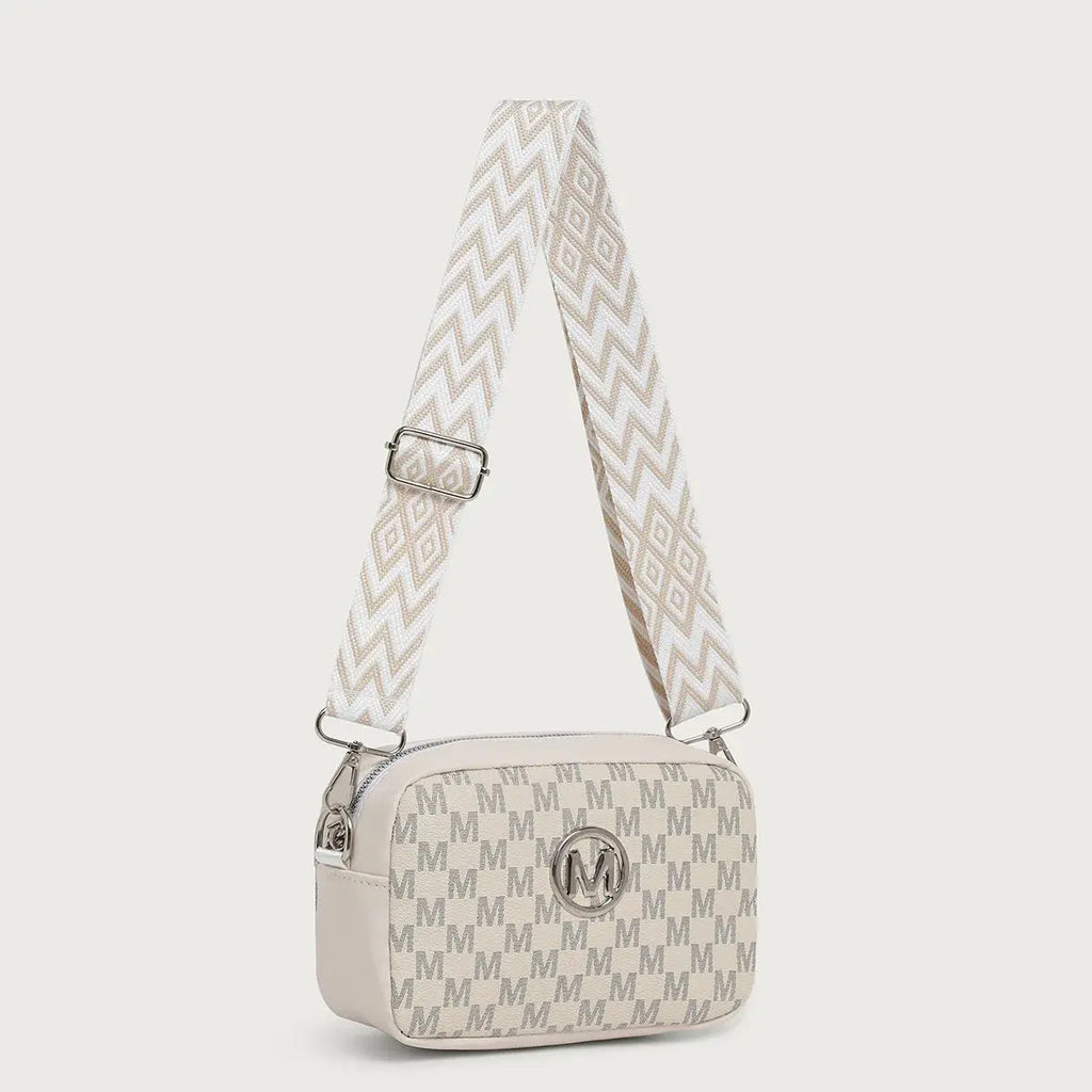 Chic crossbody bag in black PU with distinctive M pattern and wide adjustable strap.