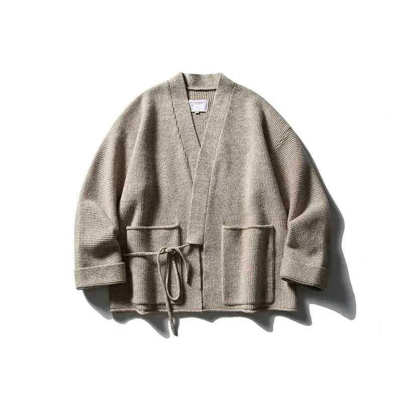 Flat lay of the City Twilight Kimono with autumn accessories, perfect for cozy chic fashion.