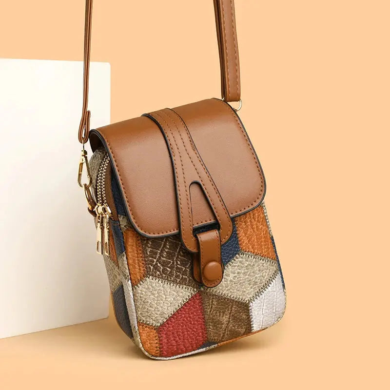 Retro plaid crossbody purse showing phone storage pocket and adjustable shoulder strap detail