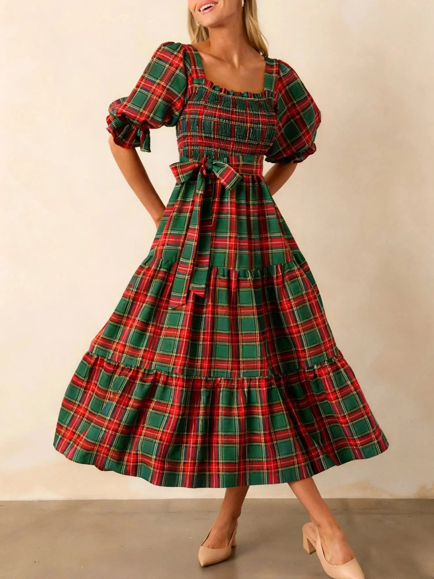 Captivate in Plaid dress featuring a classic plaid pattern and modern square neckline.