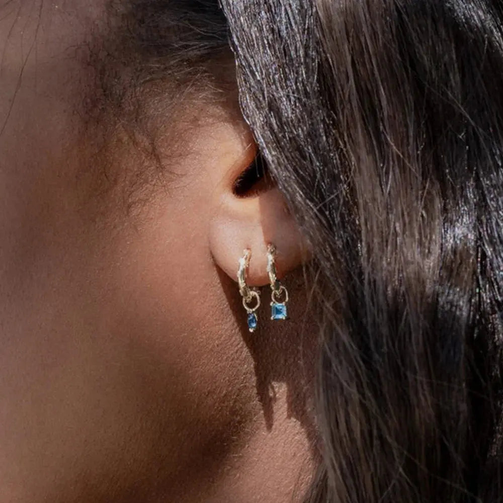 Versatile silver zircon earrings perfect for daywear or evening glamour.