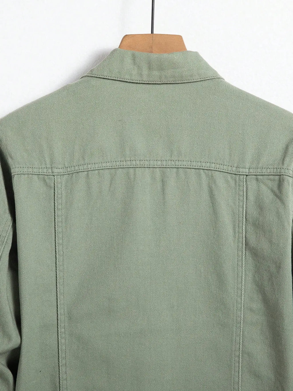Casual outerwear in unique green shade, ideal for everyday elegance.