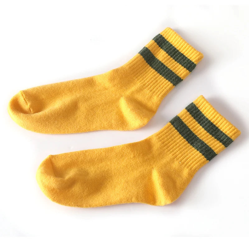Lifestyle shot of cashmere socks worn with cozy loungewear, perfect for autumn essentials.