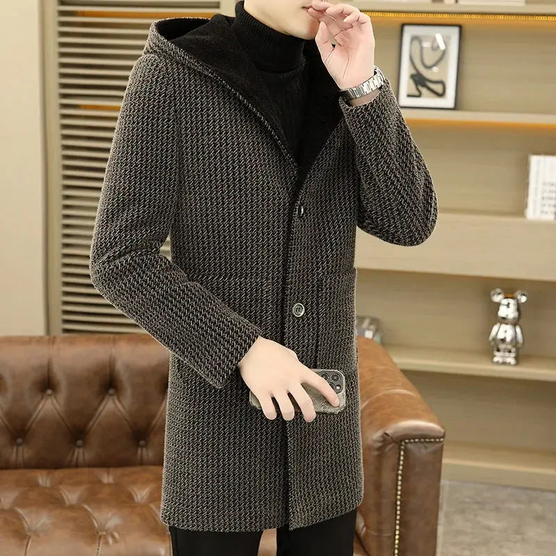 Mid-length mink wool coat featuring a single-breasted closure and refined striped pattern.