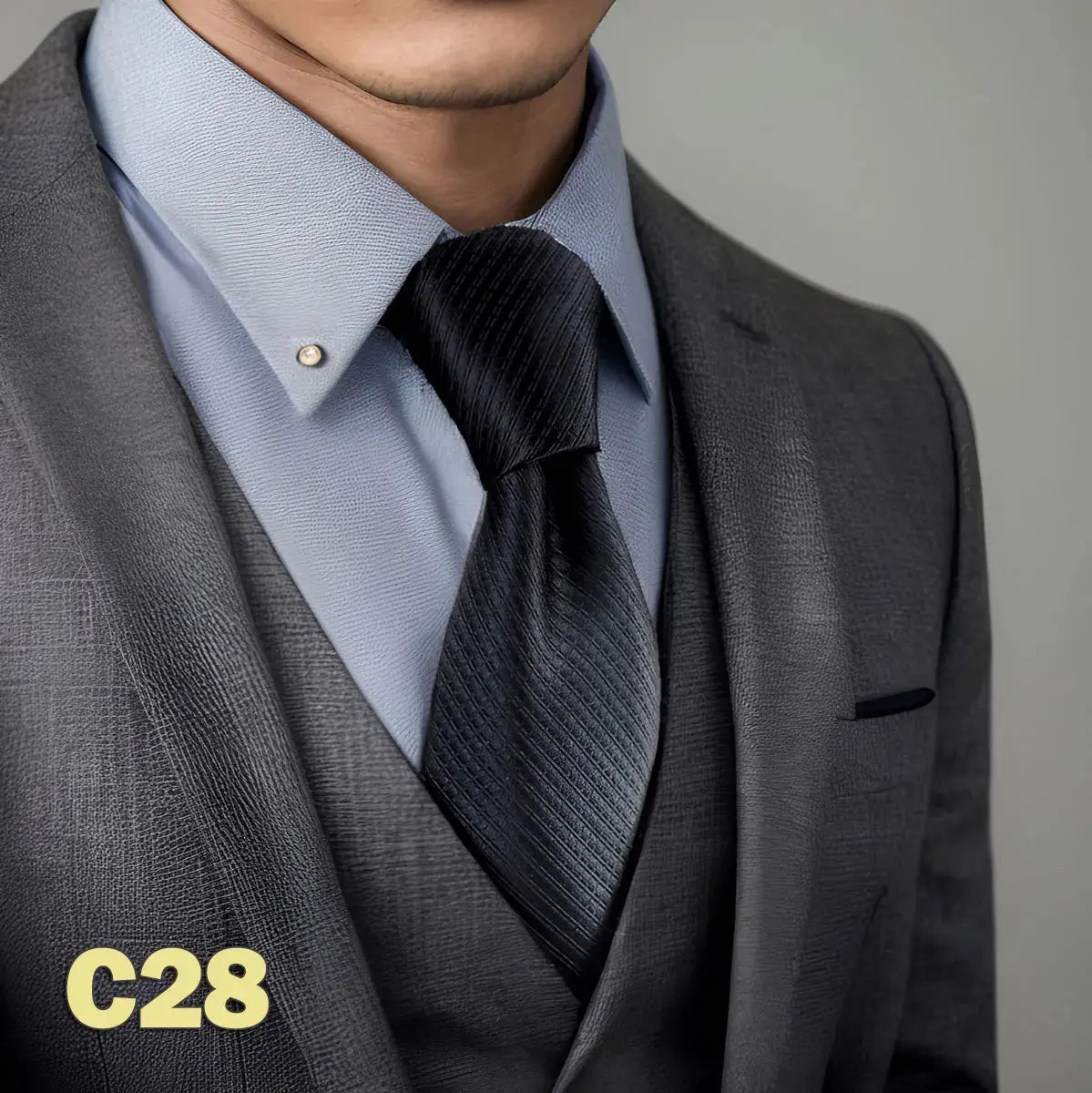 Classic black and silver patterned tie, ideal for formal occasions.