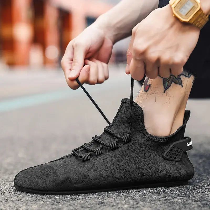 Air mesh upper of lightweight loafers, showcasing breathability and comfort.