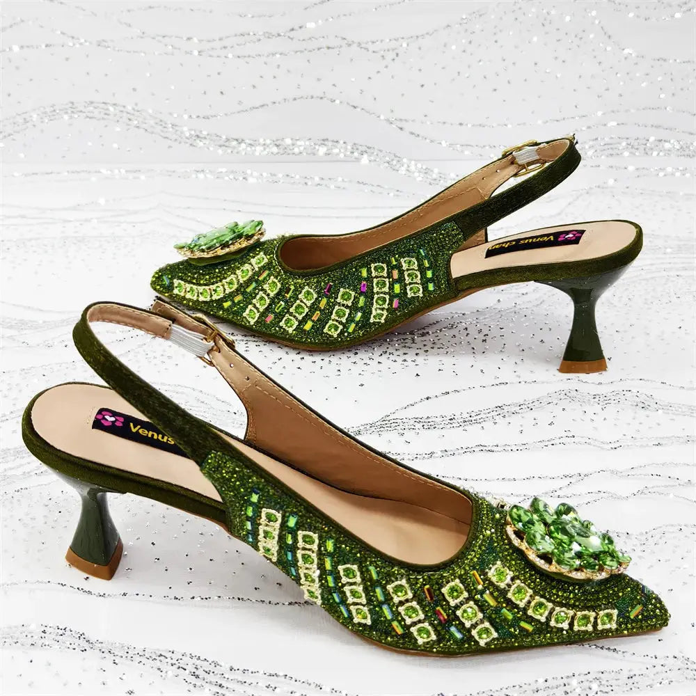 Close-up of the rhinestone details on the stylish green heels.