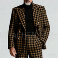 Back view of the tailored houndstooth suit, highlighting the peak lapel design.
