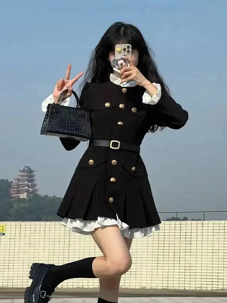 Chic black mini dress with elegant O-neck and button detailing, perfect for autumn soirées.