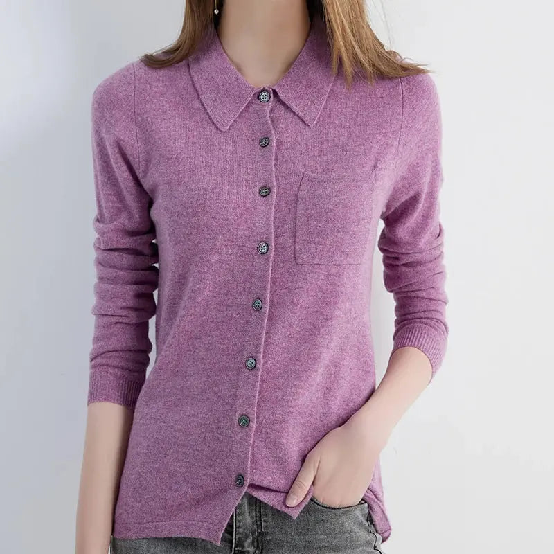 Flat lay of the Merino Wool Cardigan in a cozy autumn setting, perfect for seasonal wear.