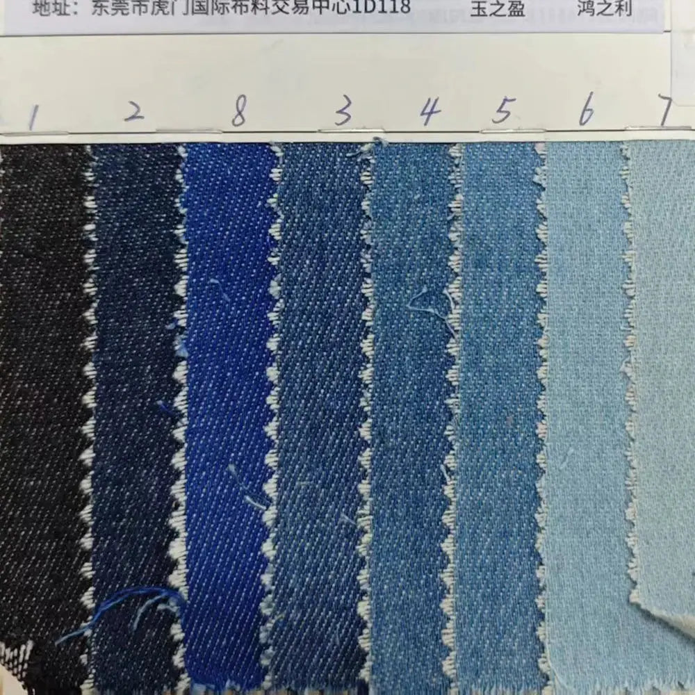 Close-up of the denim fabric, highlighting the unique rayon and polyester blend for durability.
