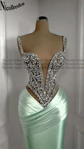 Detail of the sweetheart neckline on the Rhinestone Gala Gown, emphasizing its elegant design.
