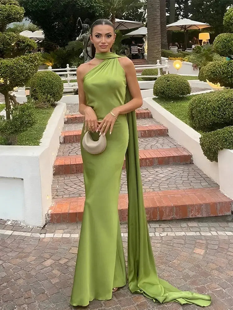 Midnight Allure Halter Gown styled with accessories for a gala look.