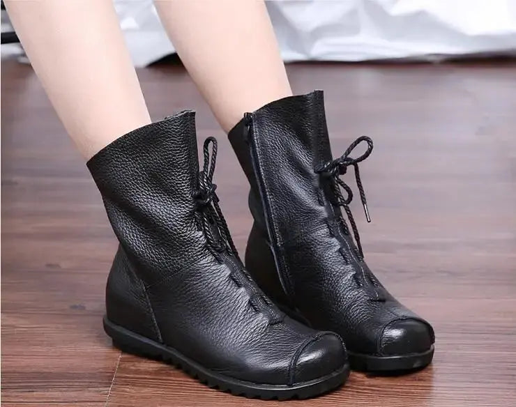 Close-up of genuine leather Cozy Enchantment boots showcasing their luxurious finish.