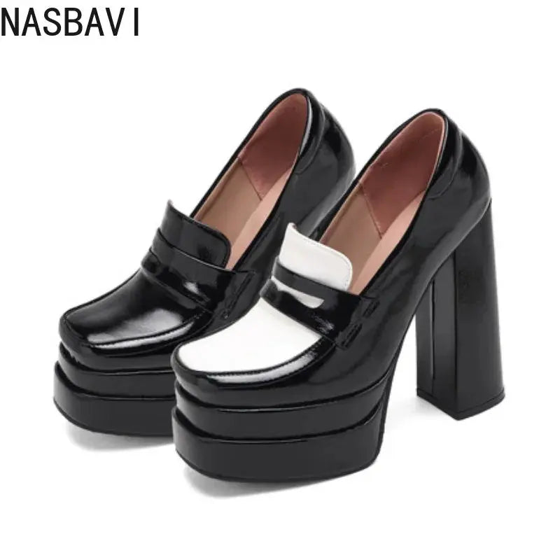 Black sculpted heel pumps with secure buckle straps for a confident stride.