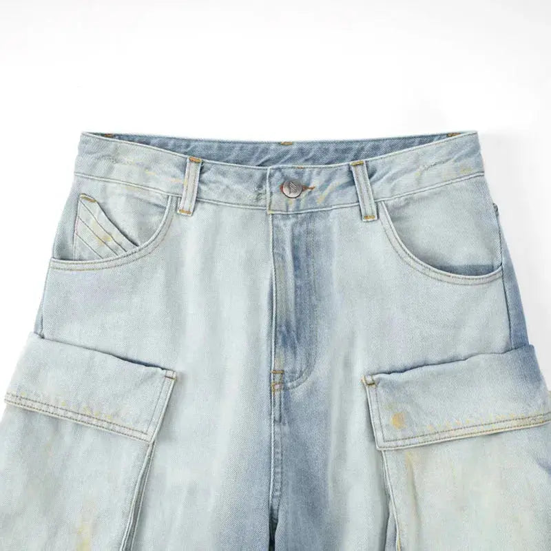 Detail of the ripped and washed effect on Rebel Spirit Wide-Leg Jeans, highlighting their edgy aesthetic.