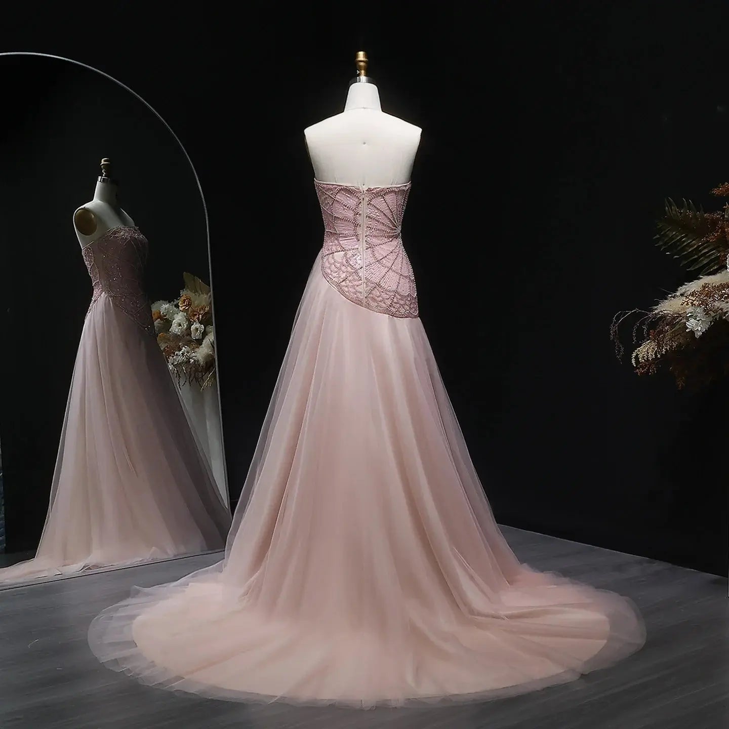Full view of the floor-length blush gown perfect for formal galas and weddings.