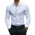 Flat lay of the Resolute White Shirt, emphasizing its classic design and color.