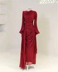 Ethereal Silk Kaftan displayed on a hanger, showcasing its luxurious satin texture.