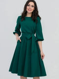 Flattering women's dress with breathable fabric, ideal for day to night wear.