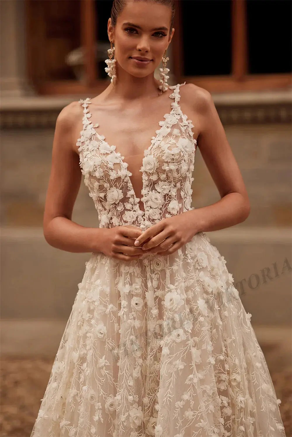 Intricate lace detailing on the Whisper of Elegance bridal gown showcasing timeless elegance.
