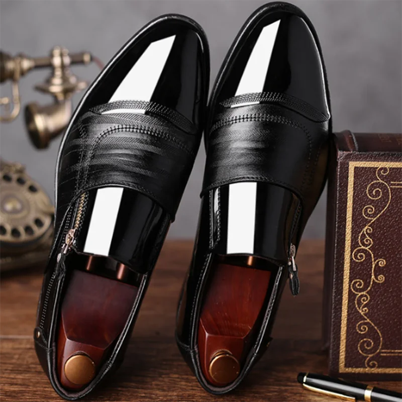 Top view of sleek black brogues highlighting the classic brogue detailing.