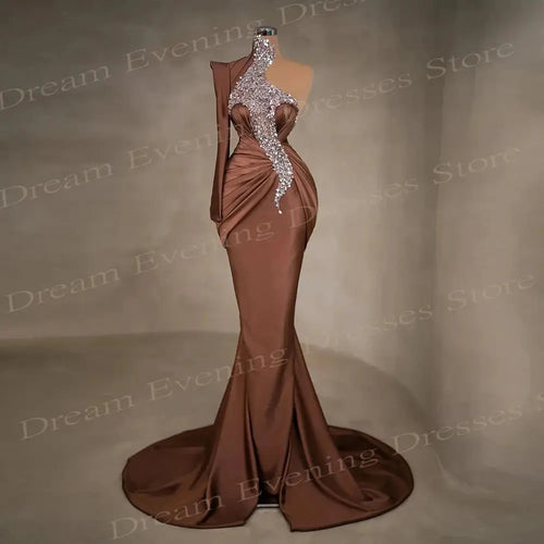 One-shoulder satin evening gown in elegant mermaid silhouette with delicate sequins and high neck design.