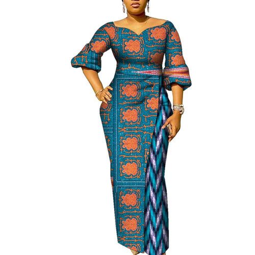 African print maxi dress featuring colorful patchwork design and billowing statement sleeves