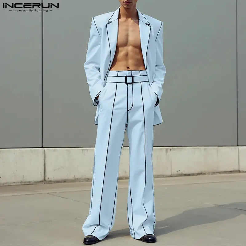 Lightweight patchwork trousers paired with a stylish blazer, perfect for modern men's fashion.