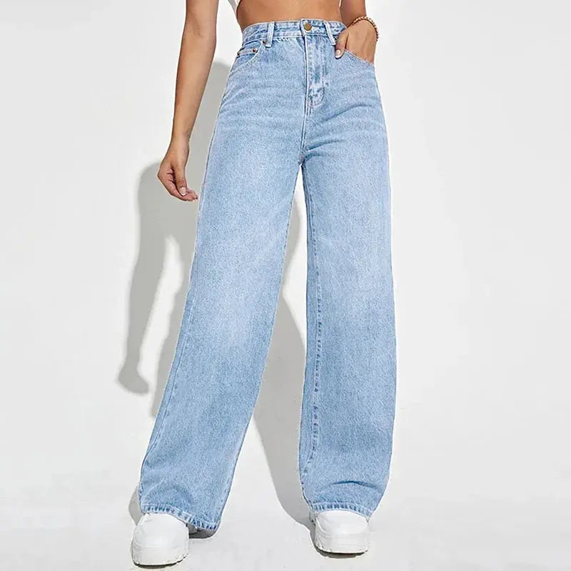 High-waist light wash denim jeans with a wide-leg cut for a modern professional look.