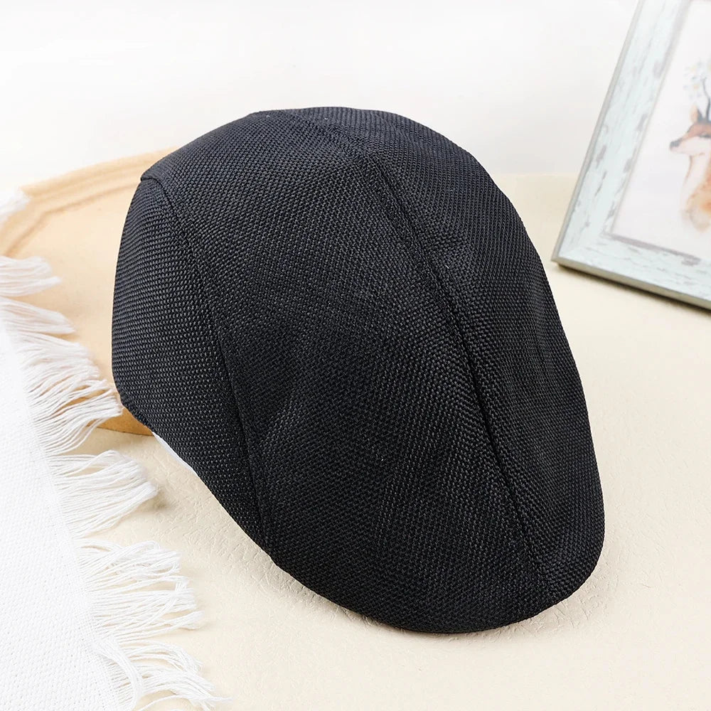 Structured peaked beret in breathable cotton denim with timeless British style