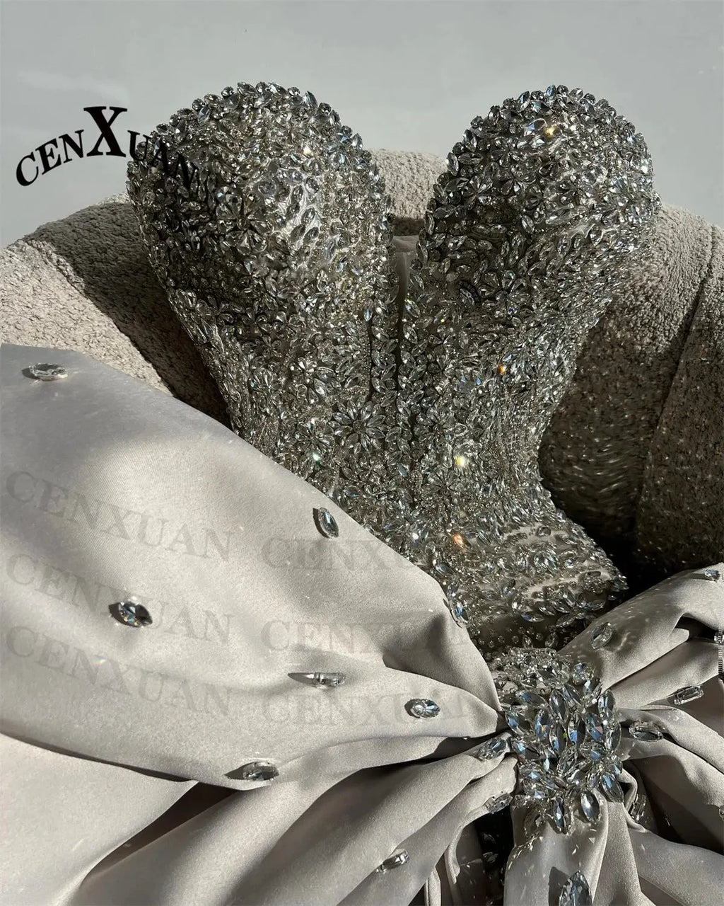 Model wearing the Rhinestone Bow Gala Dress, highlighting its tailored fit and comfortable design.