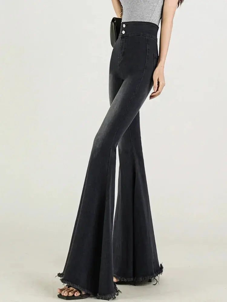 Side view of Midnight Whisper Jeans with graceful flare, perfect for casual chic outfits.