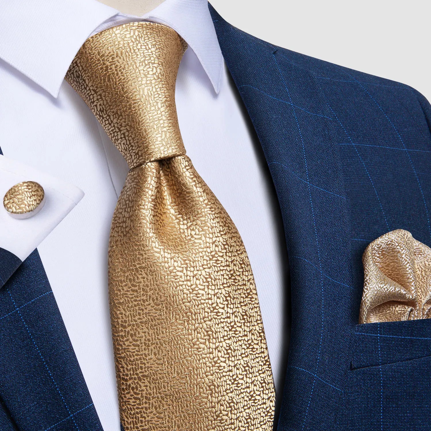 Luxurious blue paisley necktie with red accents and matching pocket square