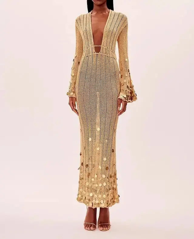 Midnight Shimmer Maxi dress displayed on a hanger, showcasing its luxurious lightweight fabric.